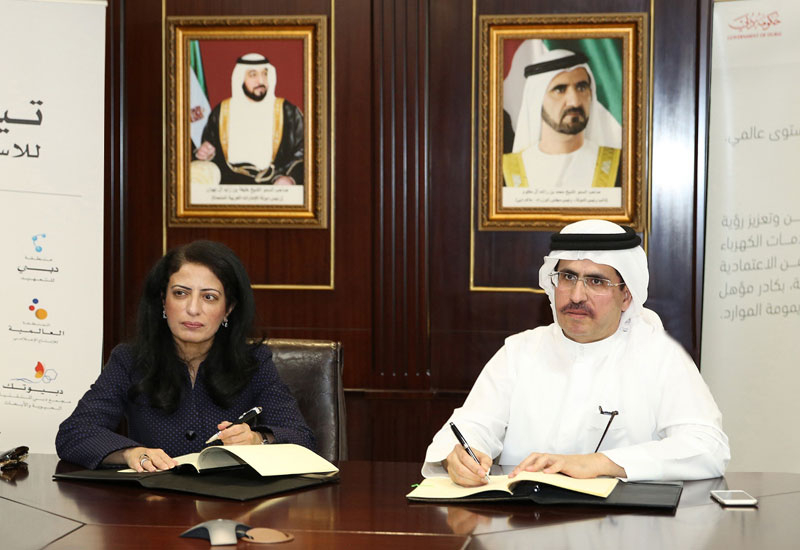Dr. Amina Al Rustamani and HE Saeed Mohammed Al Tayer Dr. Amina Al Rustamani and HE Saeed Mohammed Al Tayer