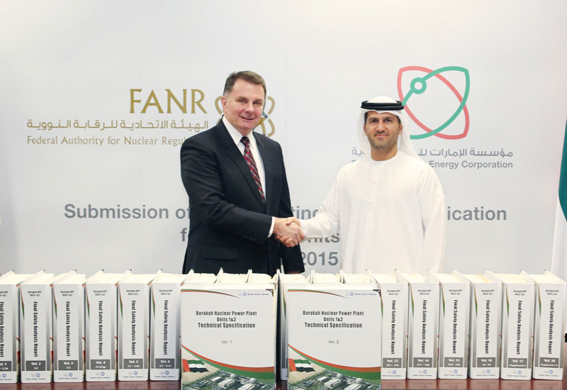 Mohamed Al Hammadi, delivers the OLA to FANR Director General, William Travers Mohamed Al Hammadi, delivers the OLA to FANR Director General, William Travers