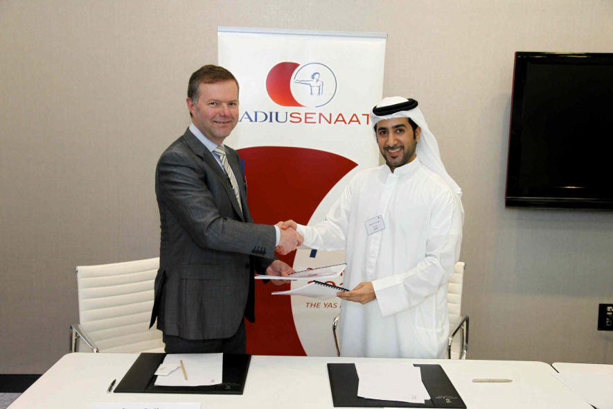 Radius Systems CEO Stuart Godfrey and Senaat Partner Khalifa Al Suwaidi shake hands on the JV agreement in Abu Dhabi. Radius Systems CEO Stuart Godfrey and Senaat Partner Khalifa Al Suwaidi shake hands on the JV agreement in Abu Dhabi.