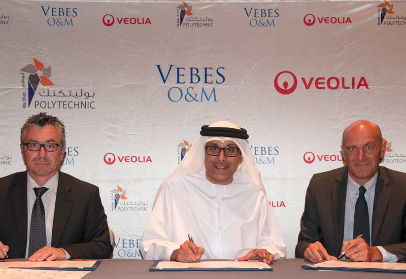 Signing the MoU. Signing the MoU.