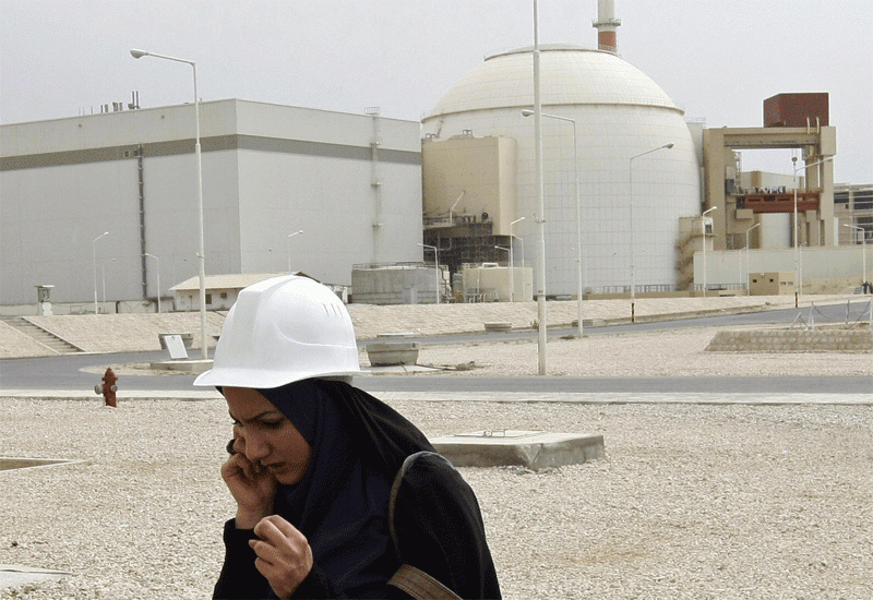 Iranian state TV reporter in front of nuclear facility. Getty Images Iranian state TV reporter in front of nuclear facility. Getty Images