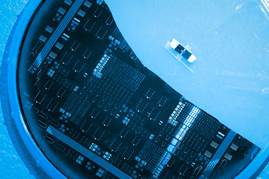 A silicon solar cell with SiGe filter using a step-cell design (large) and a GaAsP layer on silicon step-cell proof-of-concept solar cell (small). (Photo: Tahra Al Hammadi/Masdar Institute News.) A silicon solar cell with SiGe filter using a step-cell design (large) and a GaAsP layer on silicon step-cell proof-of-concept solar cell (small). (Photo: Tahra Al Hammadi/Masdar Institute News.)