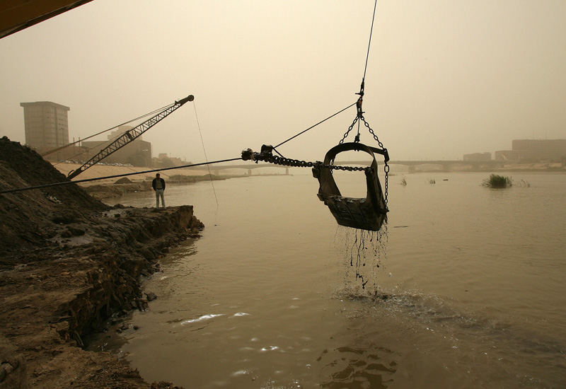 Waste being removed earlier this year from Iraq's Tigris river, which flows into the Arabian Gulf. Courtesy of AFP/Getty. Waste being removed earlier this year from Iraq's Tigris river, which flows into the Arabian Gulf. Courtesy of AFP/Getty.