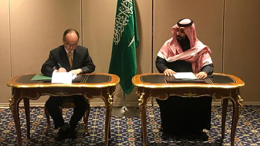 SoftBank CEO Masayoshi Son and Saudi Crown Prince Mohammed bin Salman signing a memorandum of understanding between Saudi Arabia's Public Investment Fund and the SoftBank Vision Fund. SoftBank CEO Masayoshi Son and Saudi Crown Prince Mohammed bin Salman signing a memorandum of understanding between Saudi Arabia's Public Investment Fund and the SoftBank Vision Fund.