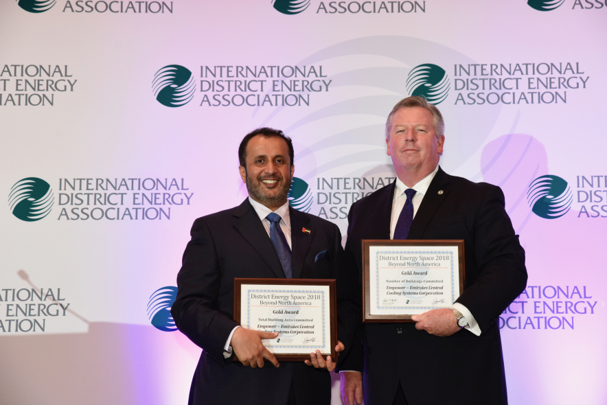 Ahmad Bin Shafar (left), CEO of Empower, receives the award Ahmad Bin Shafar (left), CEO of Empower, receives the award